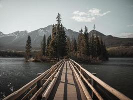 Wooden bridge to an island photo