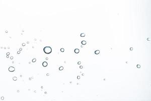 Water droplets on white background photo