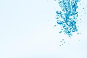 Bubbles in blue water background photo