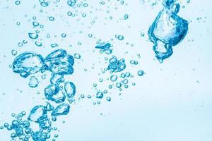 Bubbles in blue water background photo