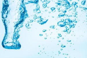 Bubbles in blue water background photo