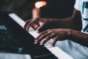 Person playing electric keyboard photo