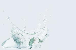 Water splash isolated on white background photo