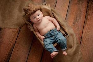Baby Boy Wearing a Cowboy Hat photo