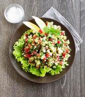 Tabbouleh salad with bulgur and parsley. photo