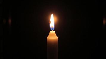 closeup of candle on black video