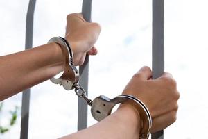Handcuffed woman need help photo