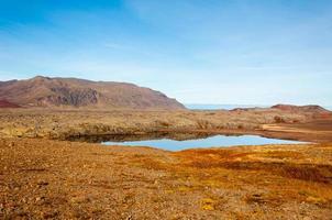 Icelandic landscape with lake and glaciers in background, Iceland photo