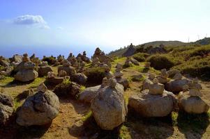 Stones balancing on top of Foia the highest mountain of Algarve photo
