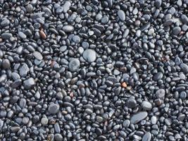 black rock pebbles mineral stones background