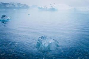 Beatiful vibrant picture of icelandic glacier and glacier lagoon photo