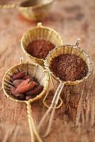 hot chocolate flakes with chilli flavor in old rustic style photo
