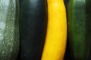 Four varieties of zucchini close up photo