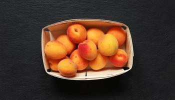 Apricots in a crate photo