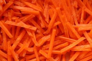 Grated raw carrots photo