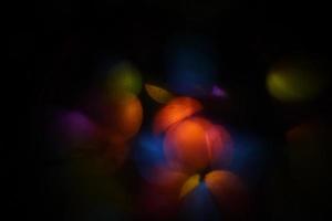 Fotografía de luz abstracta en rojo, naranja y azul. foto