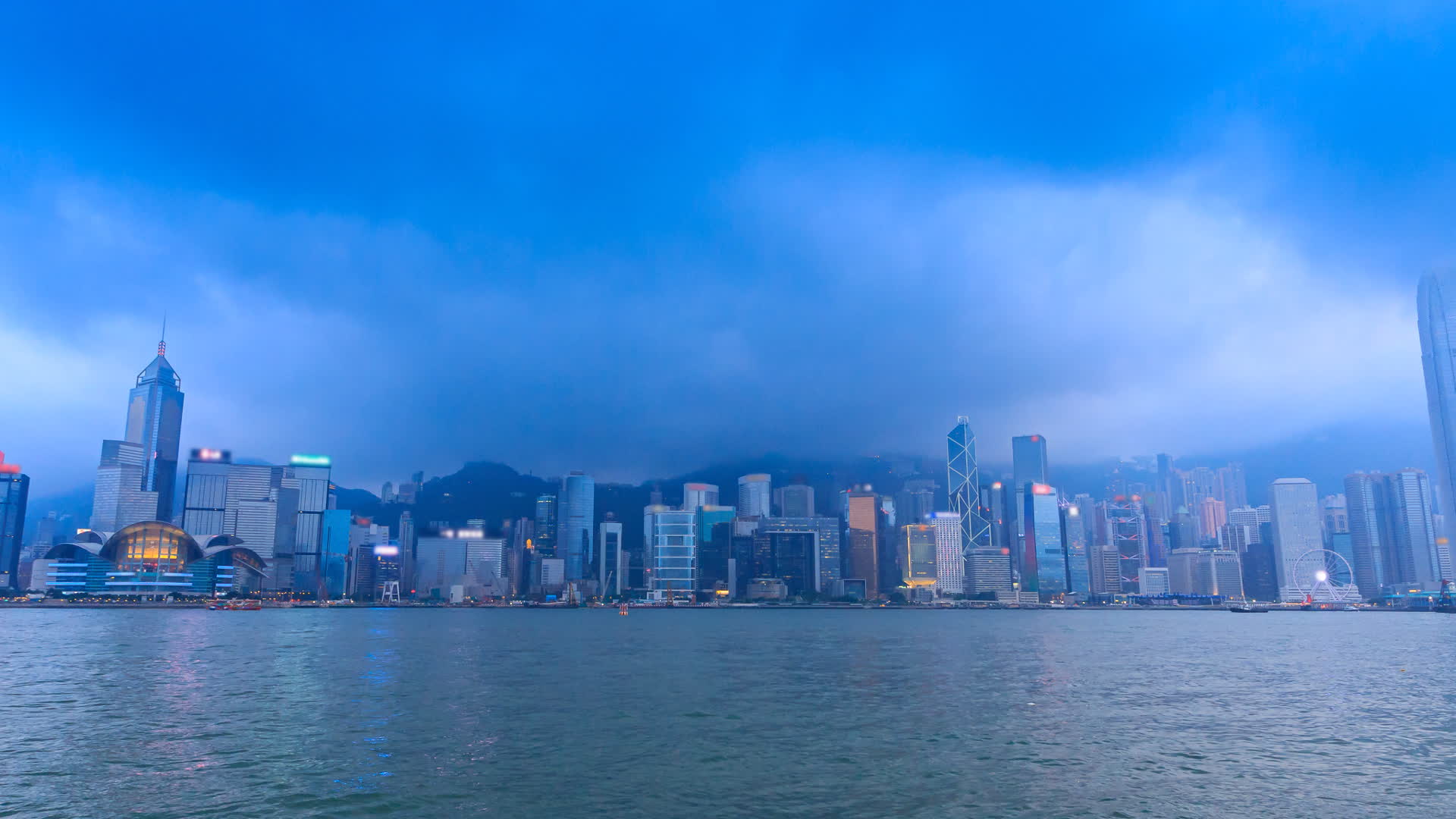 Hong Kong Victoria Harbour Cityscape Day To Night Time Lapse Of