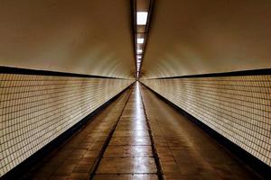 Lighted tunnel path photo