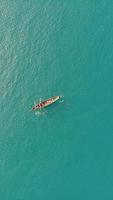 Aerial view of boat on a calm sea photo