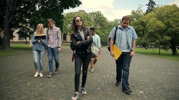 College friends walking to lessons video
