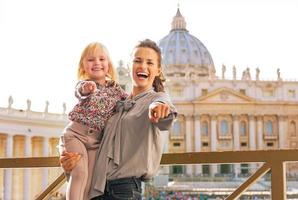 Happy mother and baby girl in vatican city state photo
