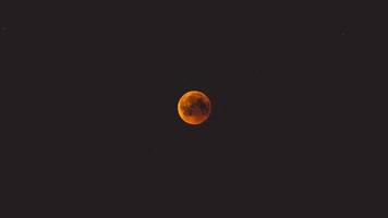 Red moon with clouds photo