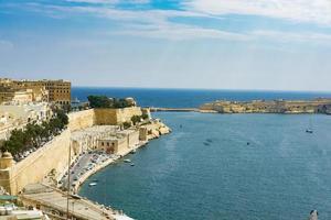 Buildings on the water in Malta photo