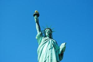 Statue of Liberty with blue sky photo