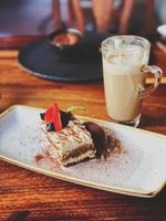 Cake with coffee on a table photo