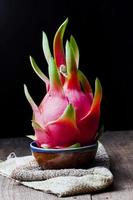 Dragon Fruit on wooden background