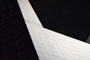 White concrete building during night time photo