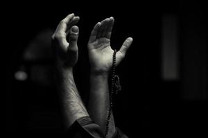 Hands Holding A Muslim Rosary photo
