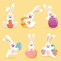 Set of Easter bunnies with decorated eggs vector