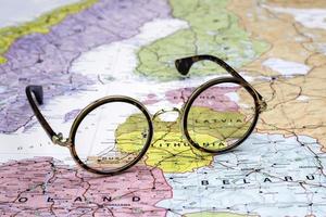 Glasses on a map of europe - Latvia
