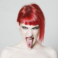 Sticking Out Tongue redhead girl