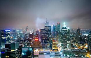 Illuminated high-rise buildings photo