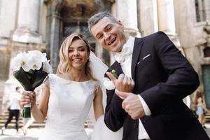 Europe, 2018 - Couple just married outside Prague church. photo