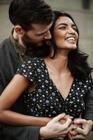 Attractive couple embraces in New York City photo