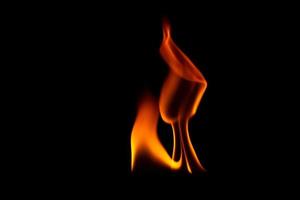 Flames over black background photo