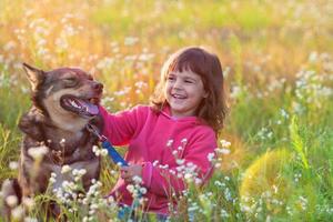 Little girl with dog photo