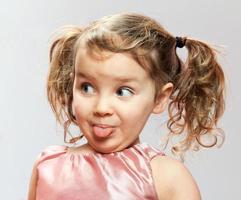 Little Girl Sticks Out Tongue photo