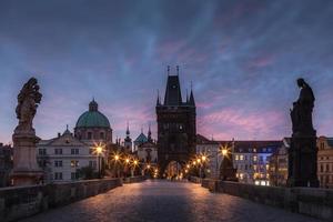 Prague. Charles Bridge at red dawn
