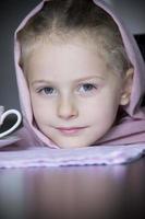 Beauty little princess with cup photo