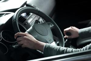 Woman driving hands close-up