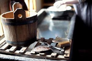 Wooden bucket and tools photo