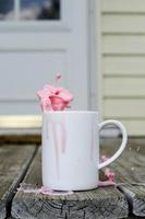 Pink milk spilling photo