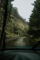 Rainy day through car windshield photo