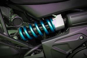 Close-up of motorcycle shock absorbers photo