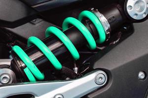 Close-up of motorcycle shock absorbers photo