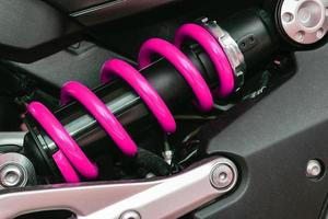 Close-up of motorcycle shock absorbers photo